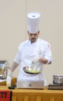 A picture of a chef in a culinary challenge. 